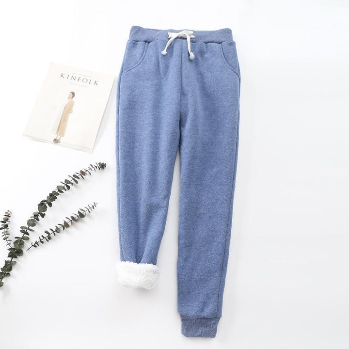 "Mjuka, värmande kashmirträningbyxor för dam i stilren fleece, perfekt för kalla dagar, i elegant, lätt design."