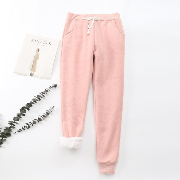 "Mjuka, värmande kashmirträningbyxor för dam i stilren fleece, perfekt för kalla dagar, i elegant, lätt design."