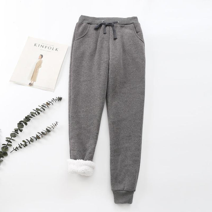 "Mjuka, värmande kashmirträningbyxor för dam i stilren fleece, perfekt för kalla dagar, i elegant, lätt design."
