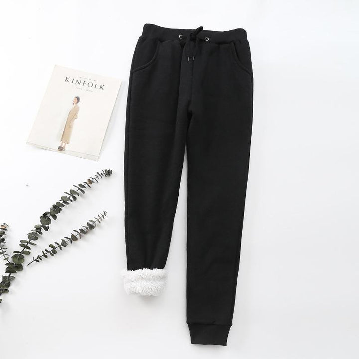 "Mjuka, värmande kashmirträningbyxor för dam i stilren fleece, perfekt för kalla dagar, i elegant, lätt design."