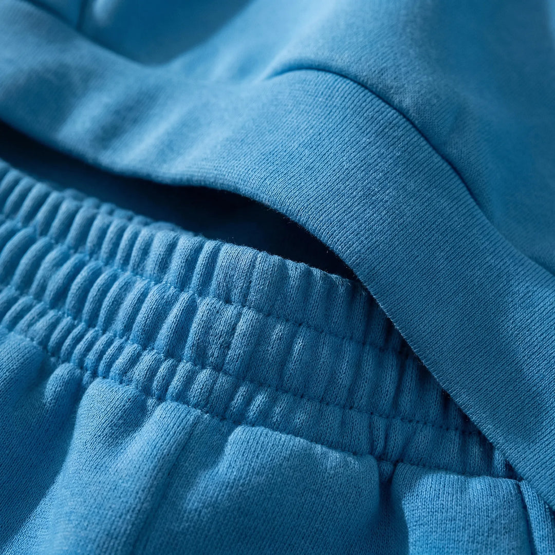 Dam-loungewear Mikayla: huvtröja och byxor. Mjukt fritidsset för hösten.