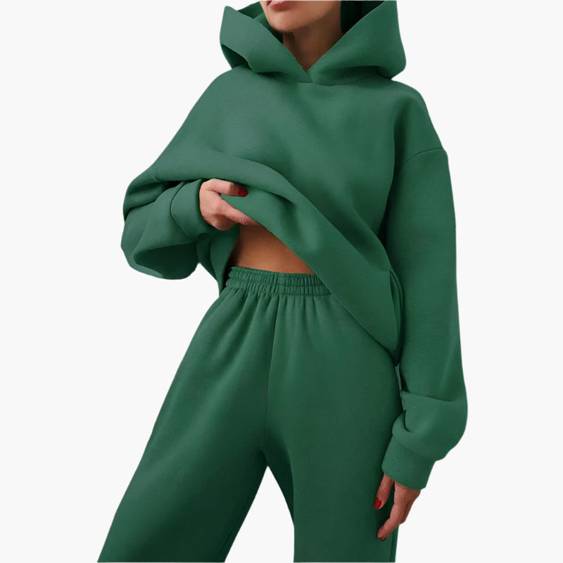 Känsla av mjukt tyg i ett grönt oversize lounge set för dam. Perfekt hoodie & joggingbyxor för avkoppling hemma.