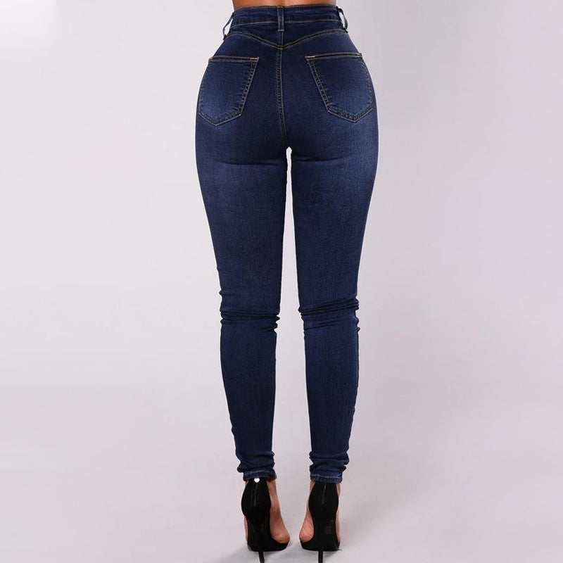 "Moderiktiga dubbelknäppta skinny-jeans med hög midja för kvinnor, sett framifrån, erbjuder stil och komfort."