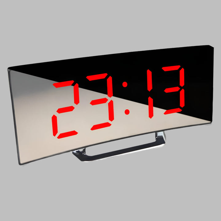 Modern böjd LED-väckarklocka med digital display & snooze. Perfekt för sovrum eller skrivbord, i minimalistisk design.