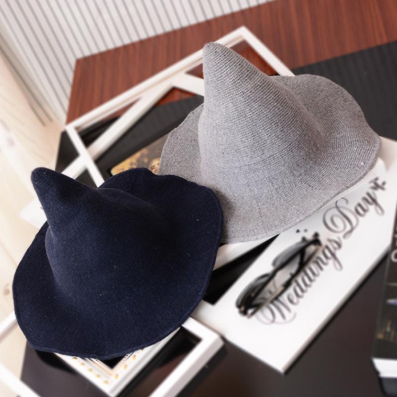 "Modern dam häxhatt i ullblandning, stilren design, finns i sex färger, elegant accessoar för fest och vardag."