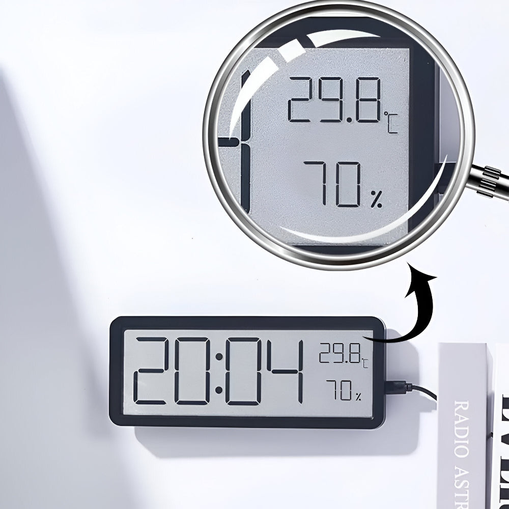 Smart digital LED-klocka med stor display. Mäter tid, temperatur och fuktighet. Perfekt för hemmet.