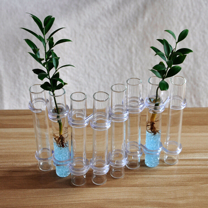 "Modern hängd blomvas av glas, flexibel och kreativ dekoration för hem och kontor, elegant och stilren design."