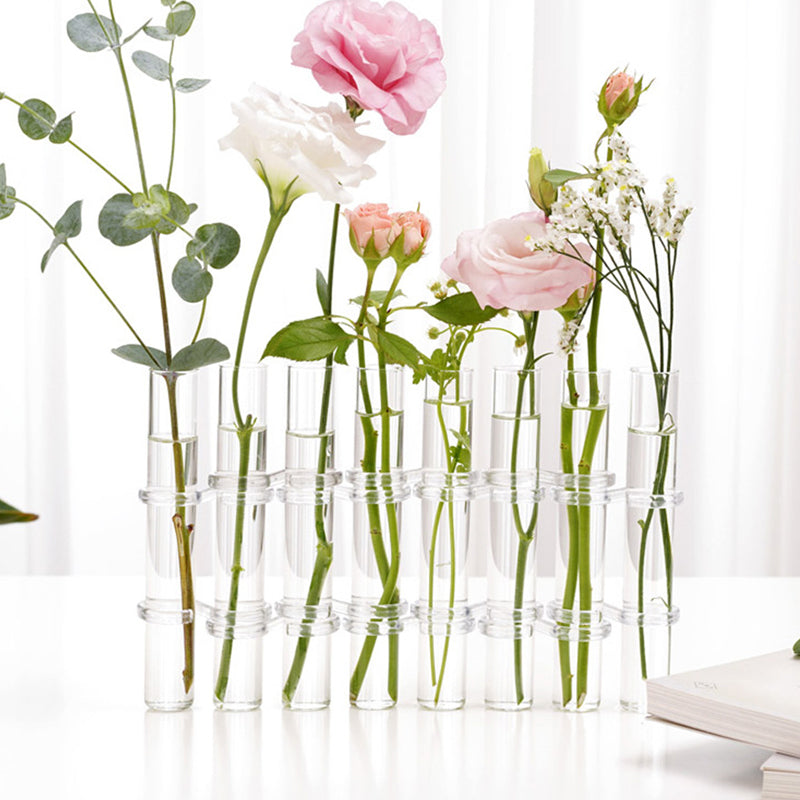 "Modern hängd blomvas av glas, flexibel och kreativ dekoration för hem och kontor, elegant och stilren design."