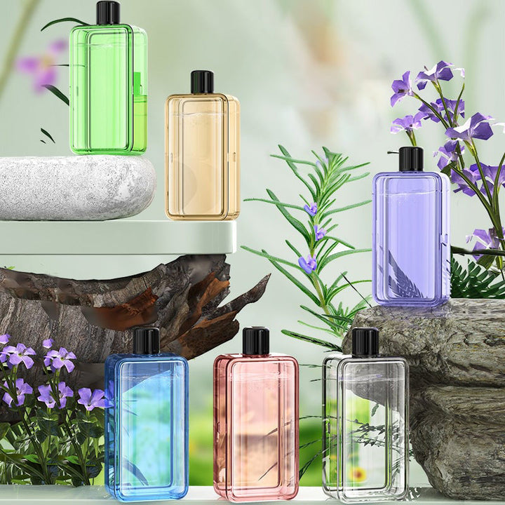 "Modern, kompakt automatisk aromaterapidiffusor, vit och stilren, för optimal doftspridning och lugn atmosfär."
