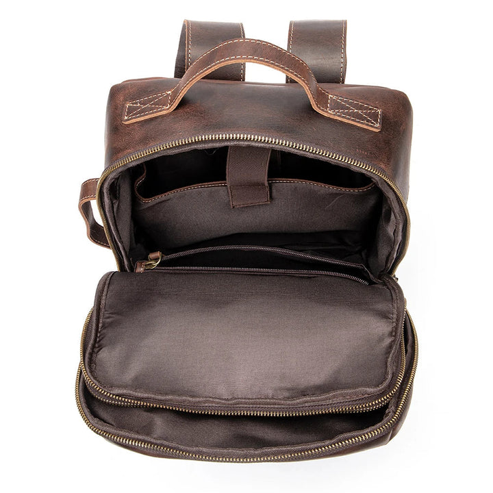 Luxe ryggsäck i Crazy Horse läder. Elegant, modern design med stöldskydd, perfekt som premium laptopväska.