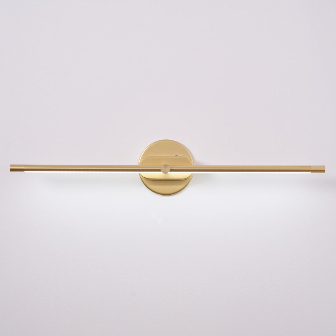 Elegant linjär LED vägglampa, svart för modern inomhusbelysning i kök eller hall.