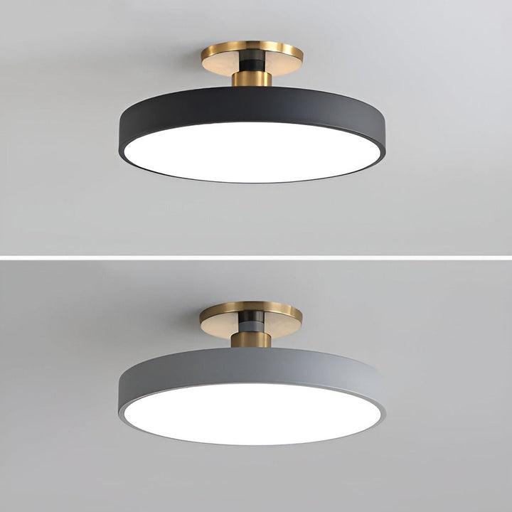 Rund LED-pendellampa med metallfinish, modern och energieffektiv design för takbelysning.