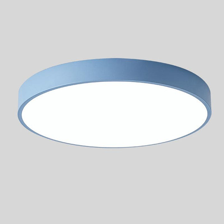 Rund LED-taklampa, varmvit belysning. Energieffektiv design för modern heminredning.