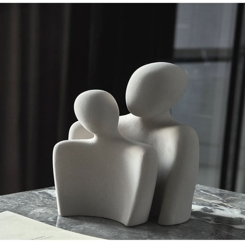 Elegant konstskulptur, en symbol för kärlek. Modern heminredning som skapar sammanhållning.
