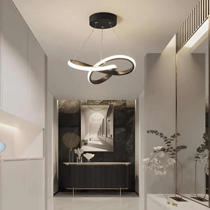 Unik designlampa: Modern LED-taklampa med spiralform. Perfekt för trendig inredning i hall eller vardagsrum.