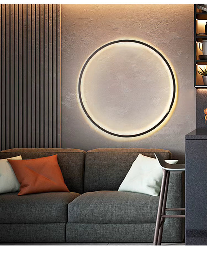 Modern LED-vägglampa, rund och svart, en chic inredningsdetalj för ditt hem.