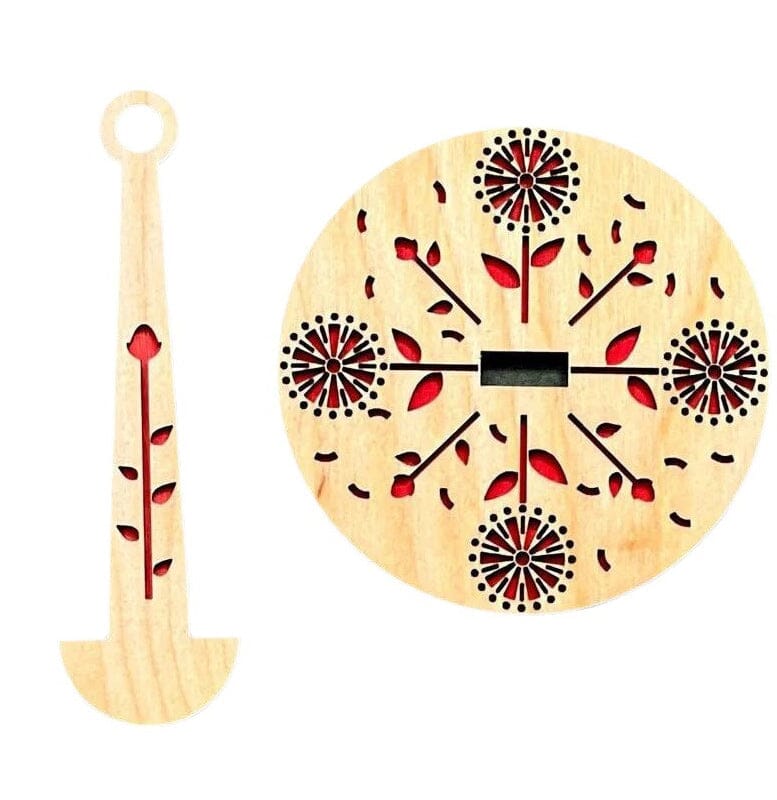 "Modern trähållare för garn i minimalistisk design, visar flera garnrullar i olika färger på en stabil träbas."