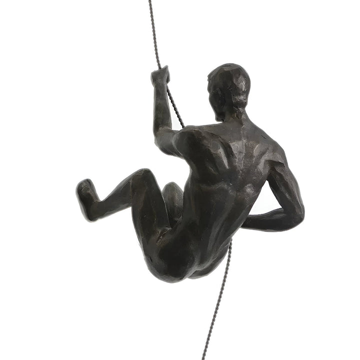 Elegant väggdekoration: set med klättrande man-figurer i resin. Konstverk för vardagsrum.