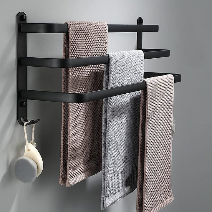 Funktionellt torkställ för flera handdukar. Elegant och platsbesparande i modern badrumsdesign.