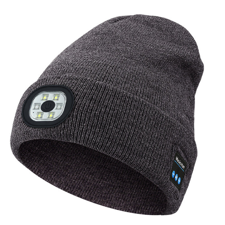 "Mörkgrå unisex Bluetooth-mössa med LED, integrerade högtalare, stil, teknik och värme i samma accessoar."