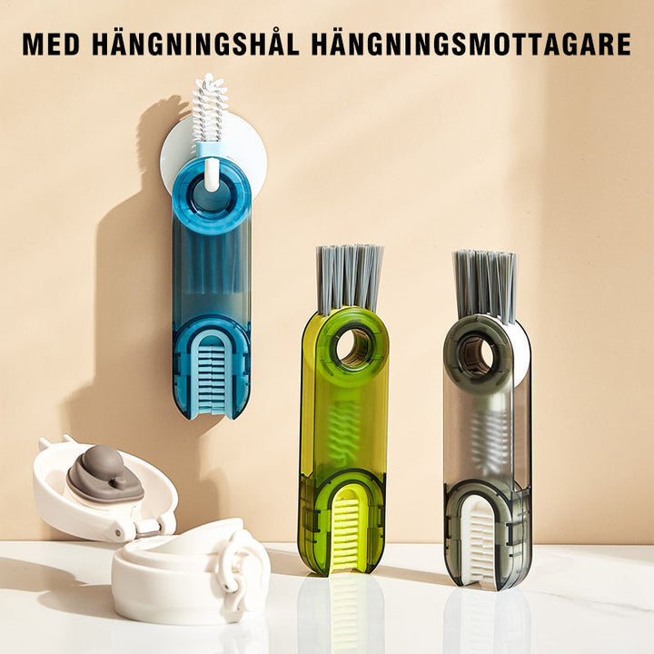 "Multifunktionell 3-i-1 rengöringsborste med unik karrotdesign, gröna toner, perfekt för muggar och flaskor i köket."