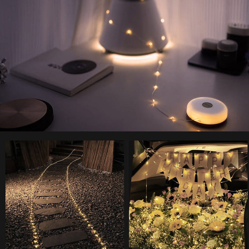 Multifunktionell bärbar campinglampa med IP67-skydd, USB-laddning, lädersnöre och ljusbälte för utomhusbruk.