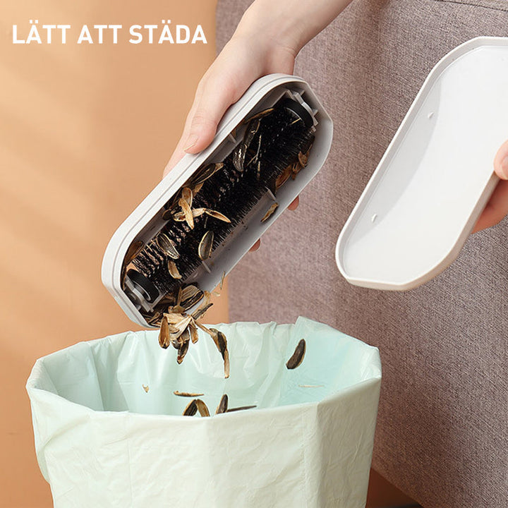 "Multifunktionell ergonomisk rullborste vit/grå, stilren och effektiv för rengöring av olika ytor."