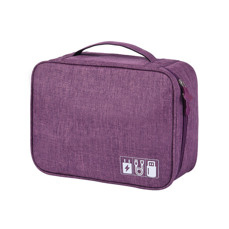 "Multifunktionell kabelförvaringspåse i vattentätt tyg med nätfickor, elastiska öglor för kablar och tillbehör."