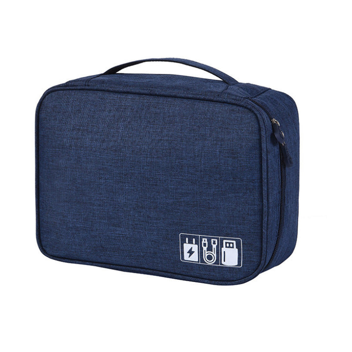 "Multifunktionell kabelförvaringspåse i vattentätt tyg med nätfickor, elastiska öglor för kablar och tillbehör."