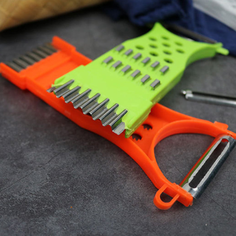 "Multifunktionell köksskalare 5-i-1 med rostfritt stålblad, ergonomisk design, perfekt för skala och skära frukt och grönsake