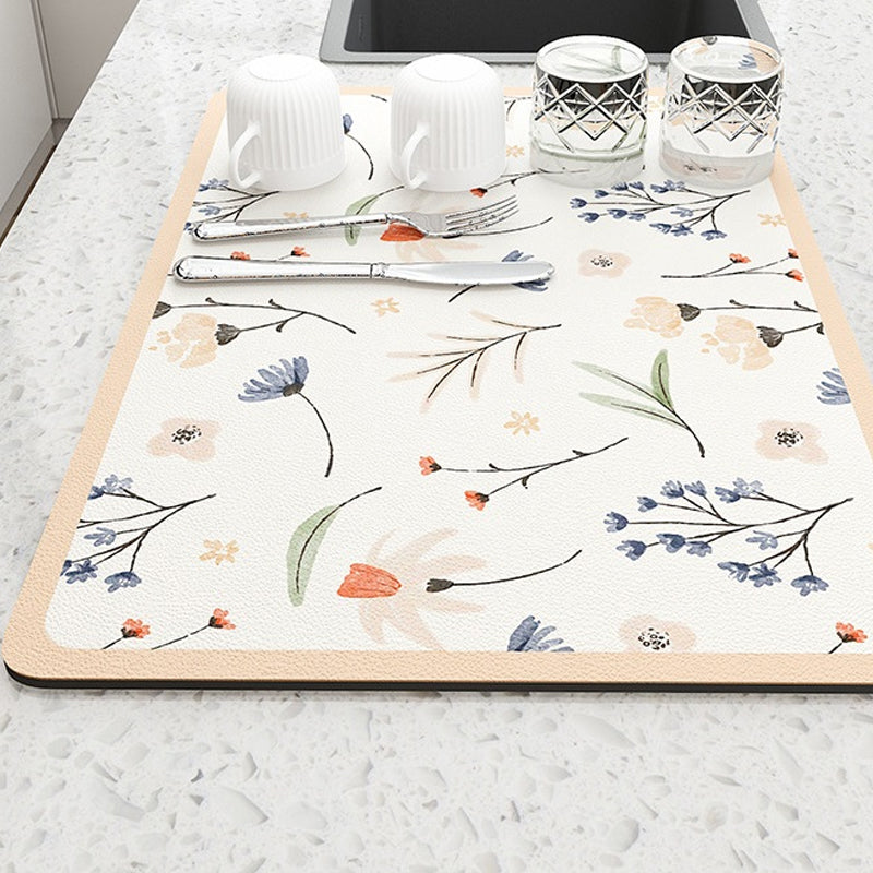 Multifunktionell silikonmatta i granna färger för kök, dekorativa mönster, absorberande, finns i 30x40 eller 40x50 cm.