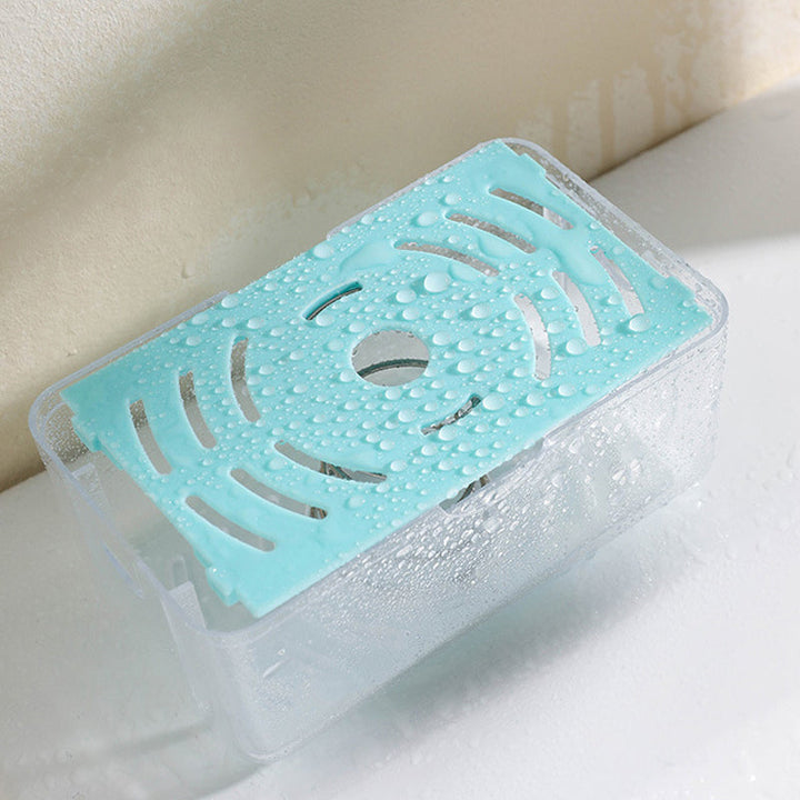 "Multifunktionell tvållåda i grå och blå, kompakt för badrum, med bubbelgenerator och anti-glid, hållbart PP-material."