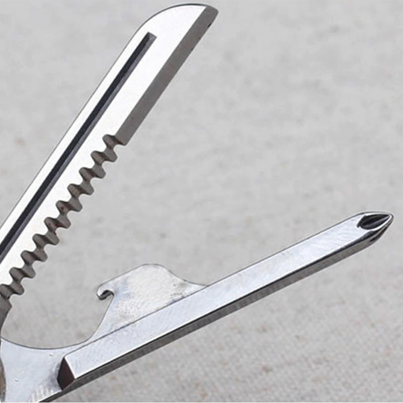 Multifunktionellt 6-i-1 nyckelverktyg i rostfritt stål, kompakt och bärbart. Perfekt för äventyrare och gör-det-själv-entusia