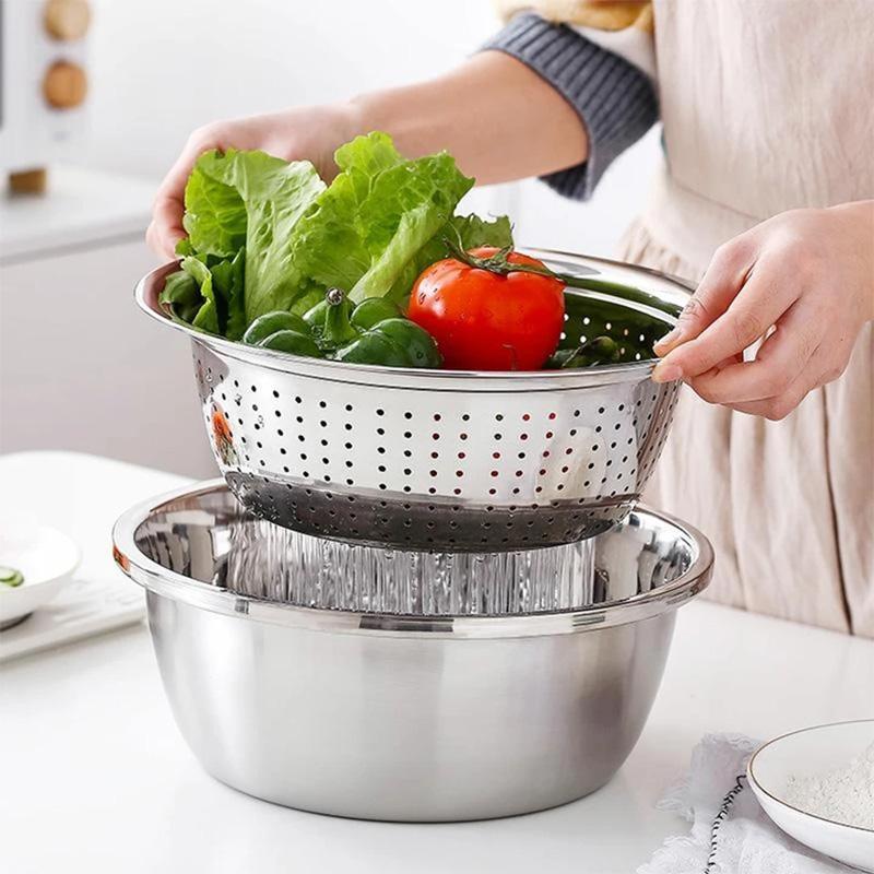 "Multifunktionellt skålset i rostfritt stål för köket med rivjärn, dräneringsbricka och basskål, 26 cm i diameter."