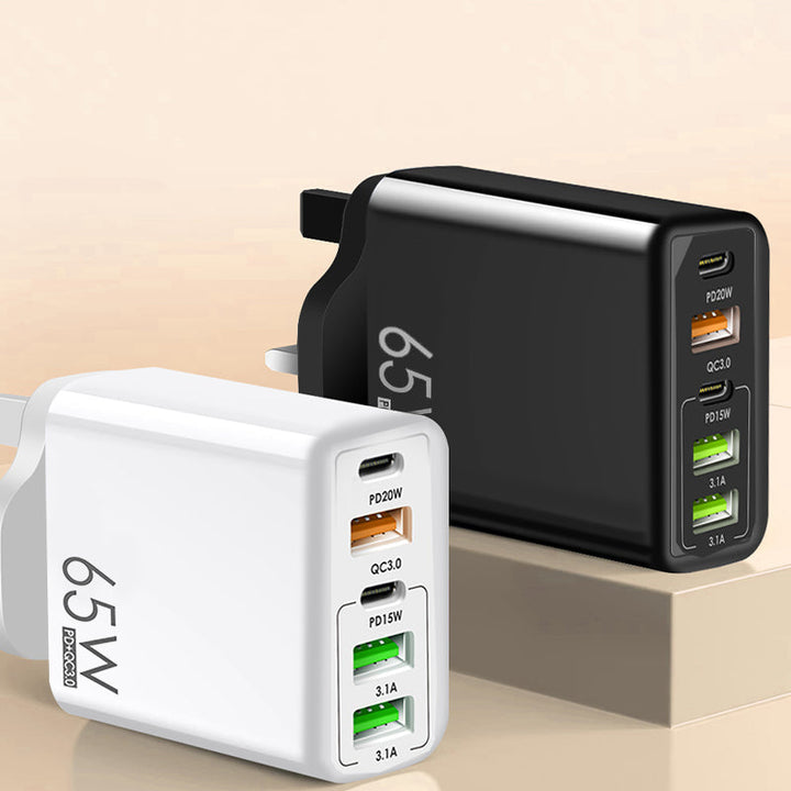 "Multiportadapter 65W snabbladdare, kompakt design, flera USB-portar, laddar flera enheter snabbt och effektivt."