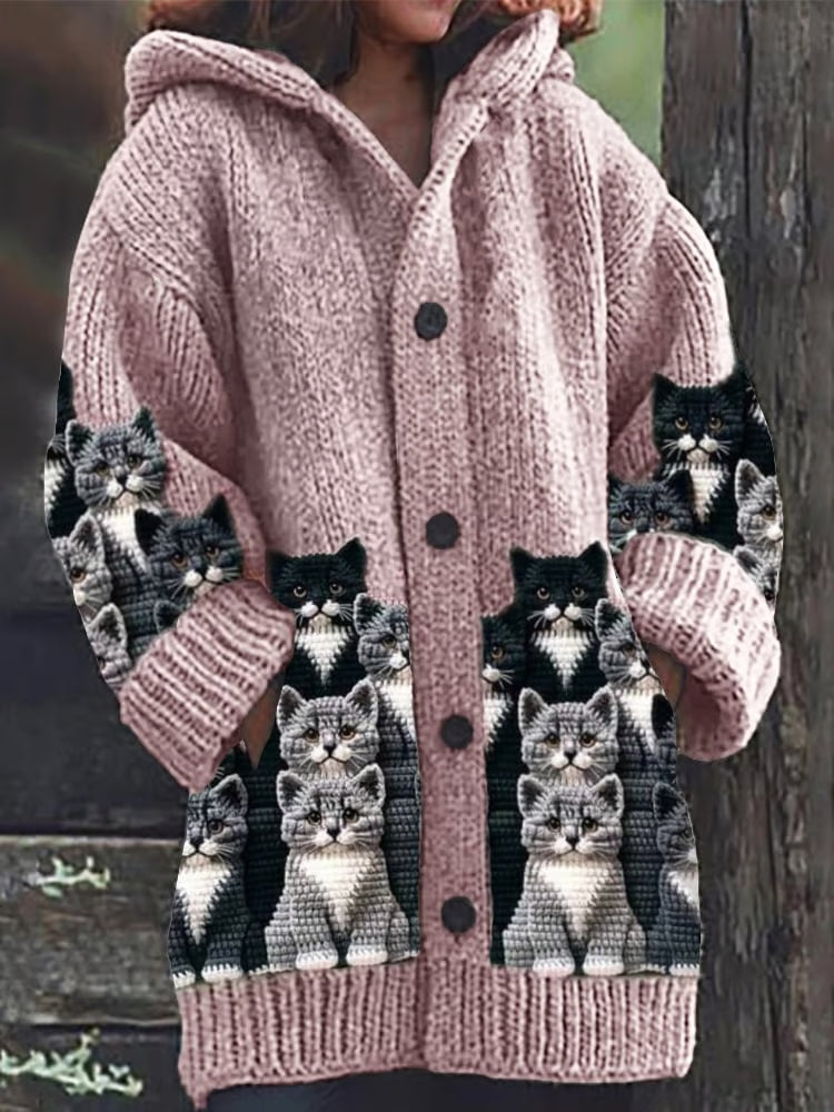 Grå damkofta med gulligt kattmotiv, idealisk för en mysig och avslappnad stil på vintern.
