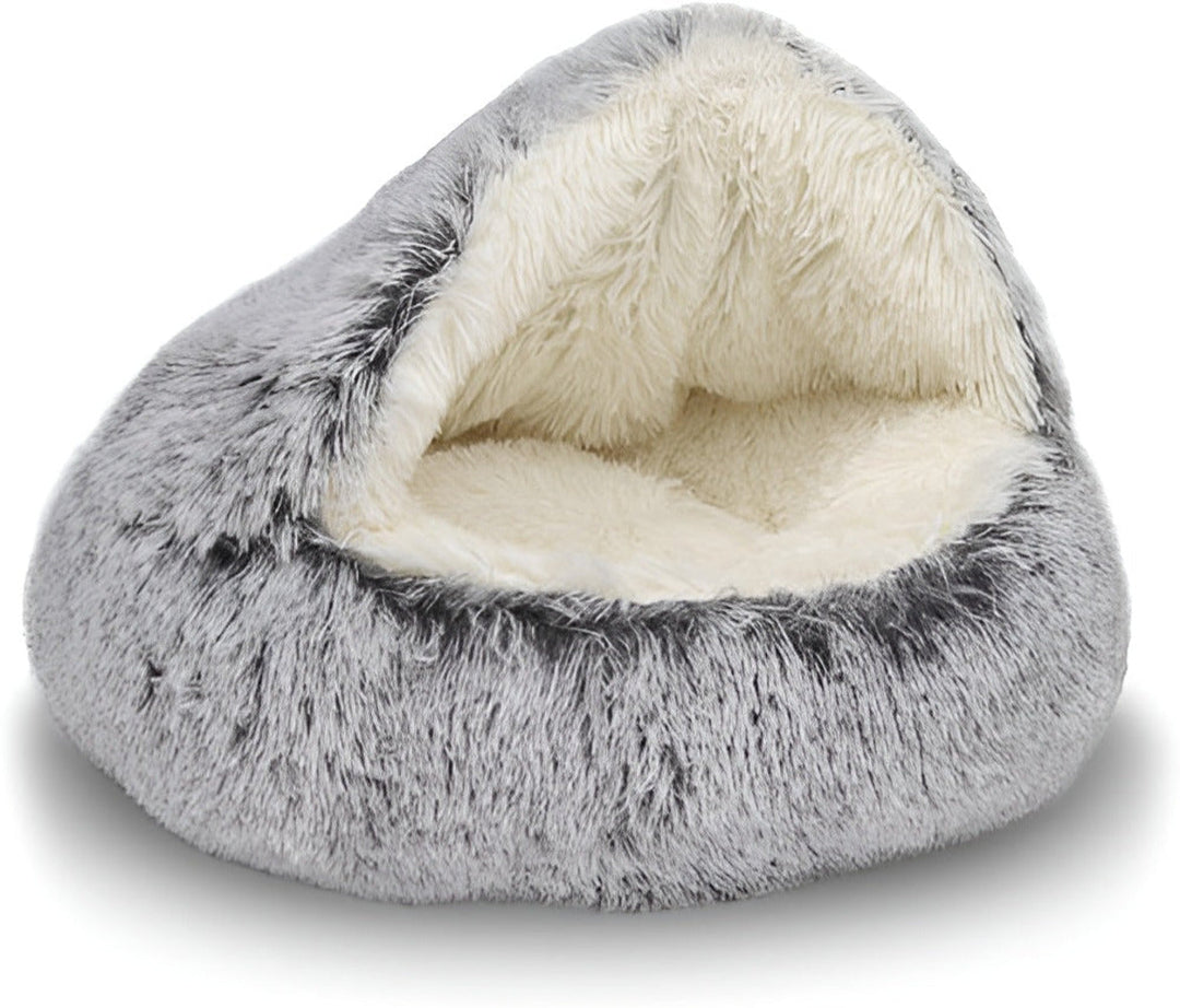 En fluffig, varm rund kattsäng som också är en skön hundsäng. Mysig och tvättbar för smådjur.