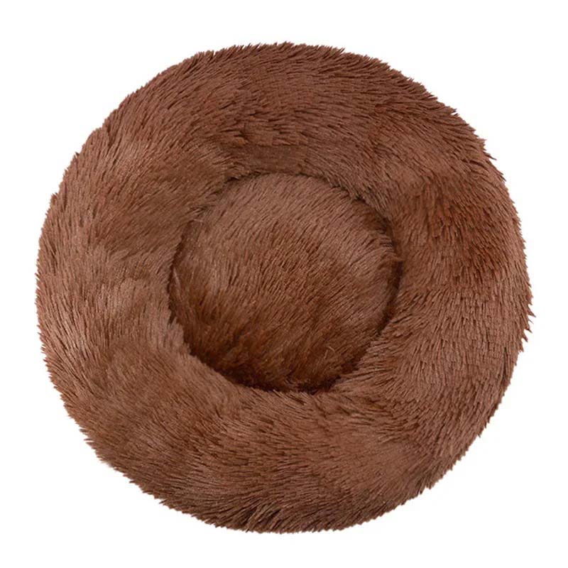 Varm och mysig rund kattbädd av plyschmaterial, perfekt sovplats för kalla dagar.