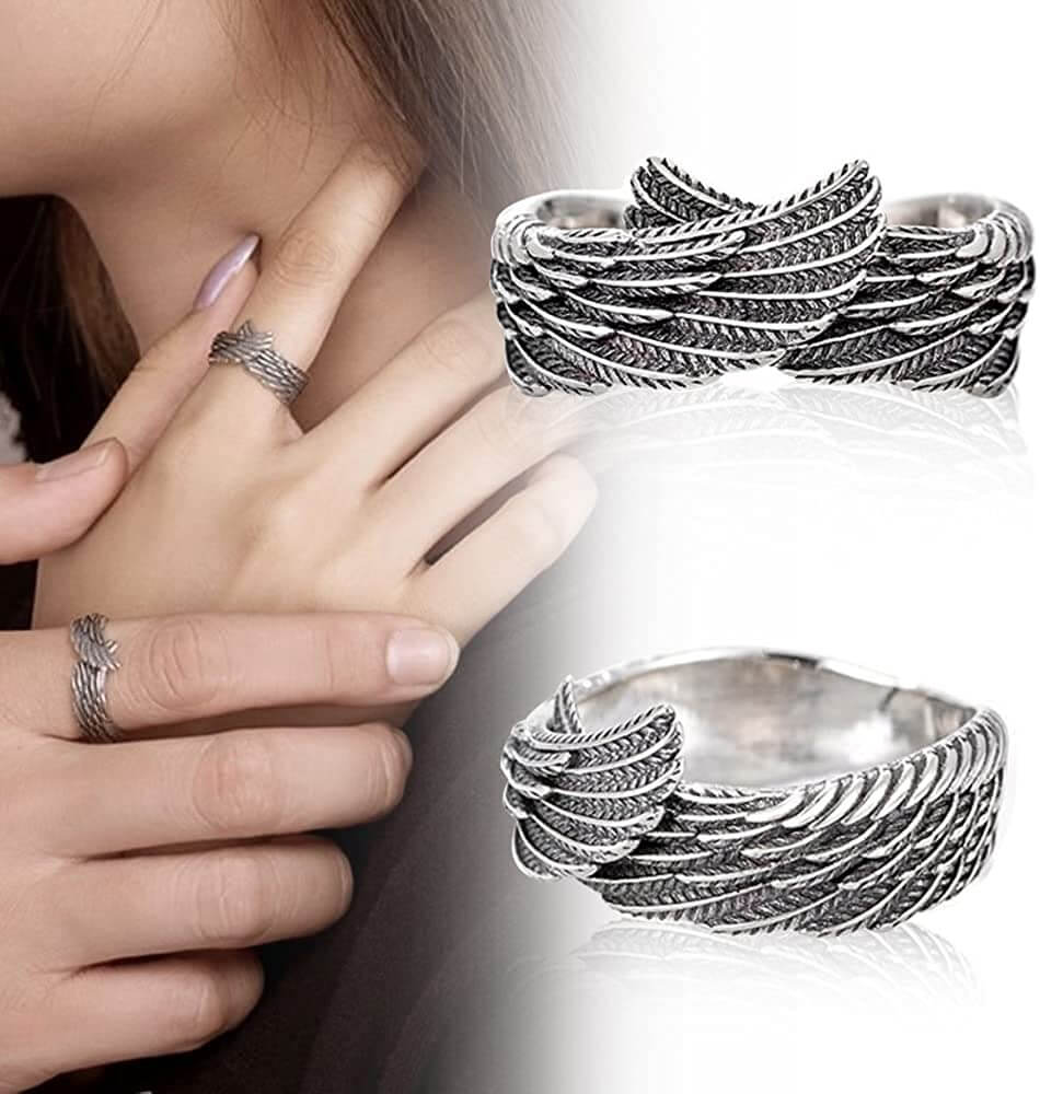 "Änglavinge ring i sterling silver för kvinnor, med detaljerad ängelvingdesign. Perfekt som elegant kvinnlig accessoar."