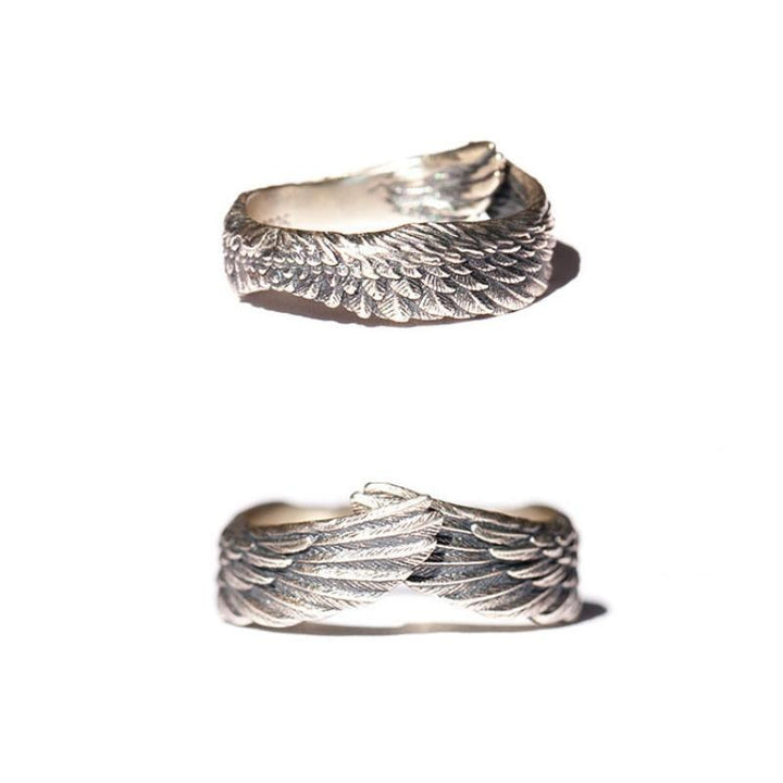 "Änglavinge ring i sterling silver för kvinnor, med detaljerad ängelvingdesign. Perfekt som elegant kvinnlig accessoar."