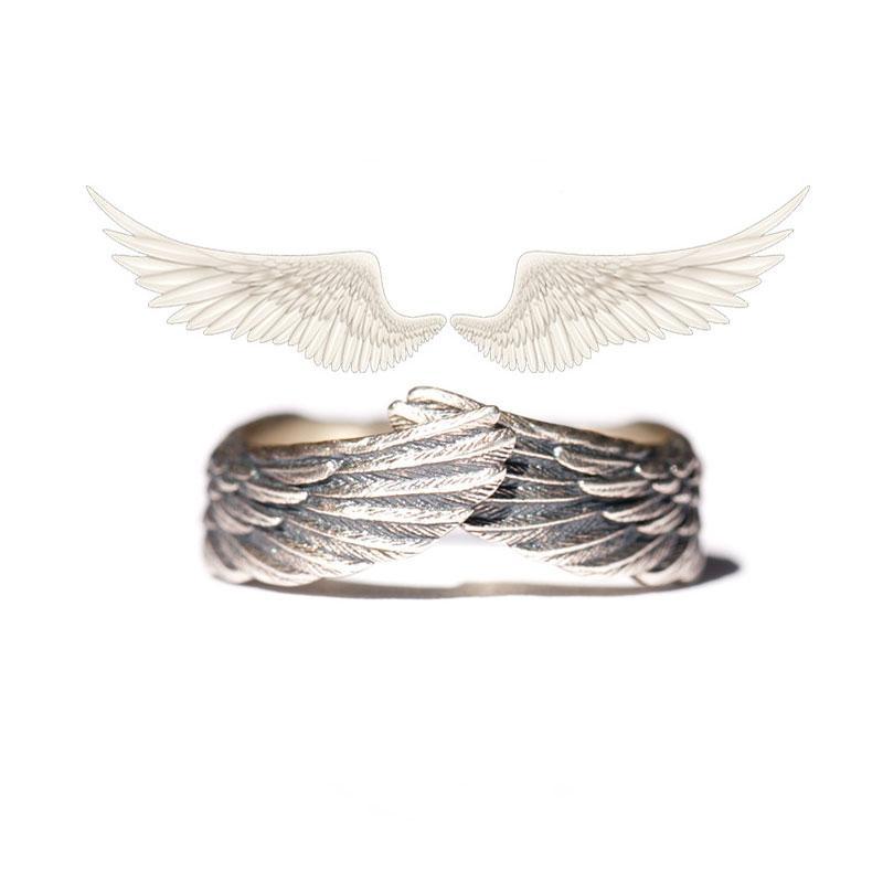 "Änglavinge ring i sterling silver för kvinnor, med detaljerad ängelvingdesign. Perfekt som elegant kvinnlig accessoar."