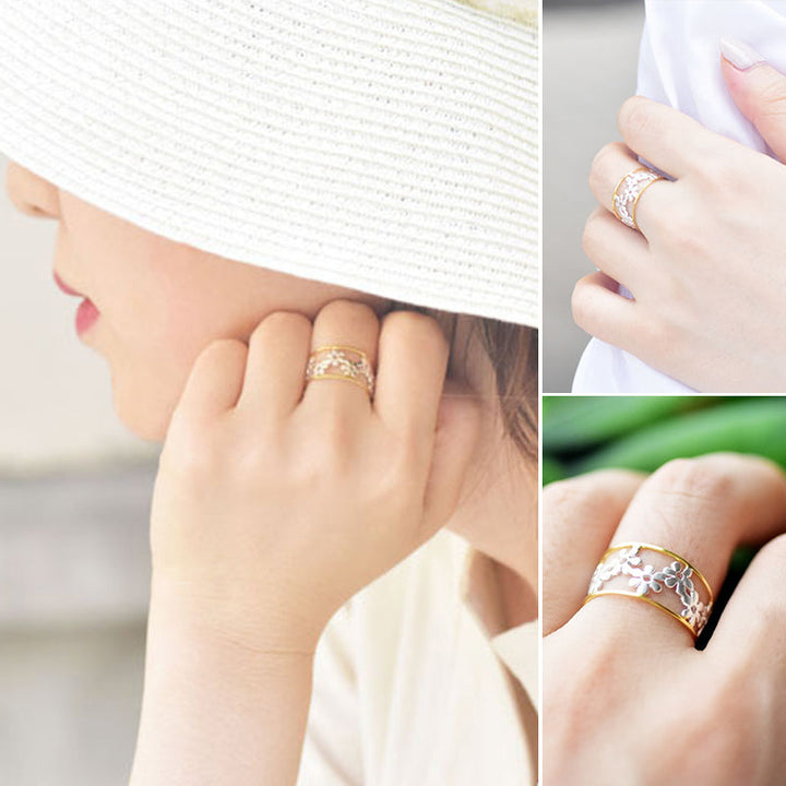 Oregelbunden ihålig tusensköna ring för kvinnor, justerbar design i legering, elegant och handgjord accessoar.