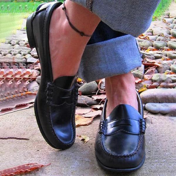 Bekväma ortopediska damskor, svarta loafers som stödjer foten för långa dagar, perfekt för arbete och fritid.