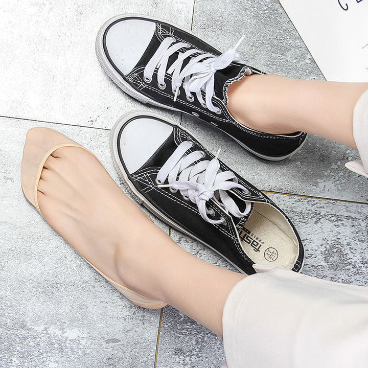 "Osynliga damfotkuddar i sockstil, dämpande för komfort i alla skostilar, svarta och beiga, storlek 35-39."