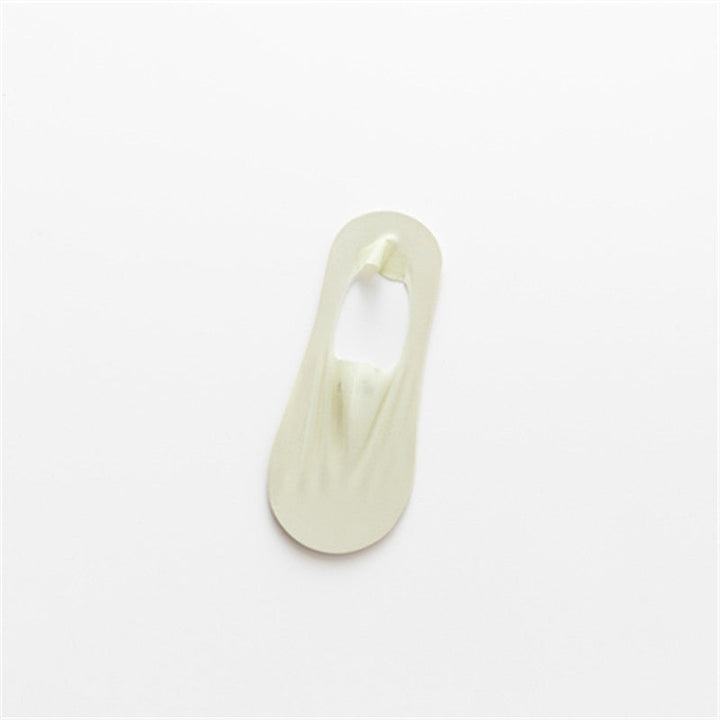 "Osynliga issilkesstrumpor med silikongrepp, osynlig design, i olika färger för maximal komfort och stil."