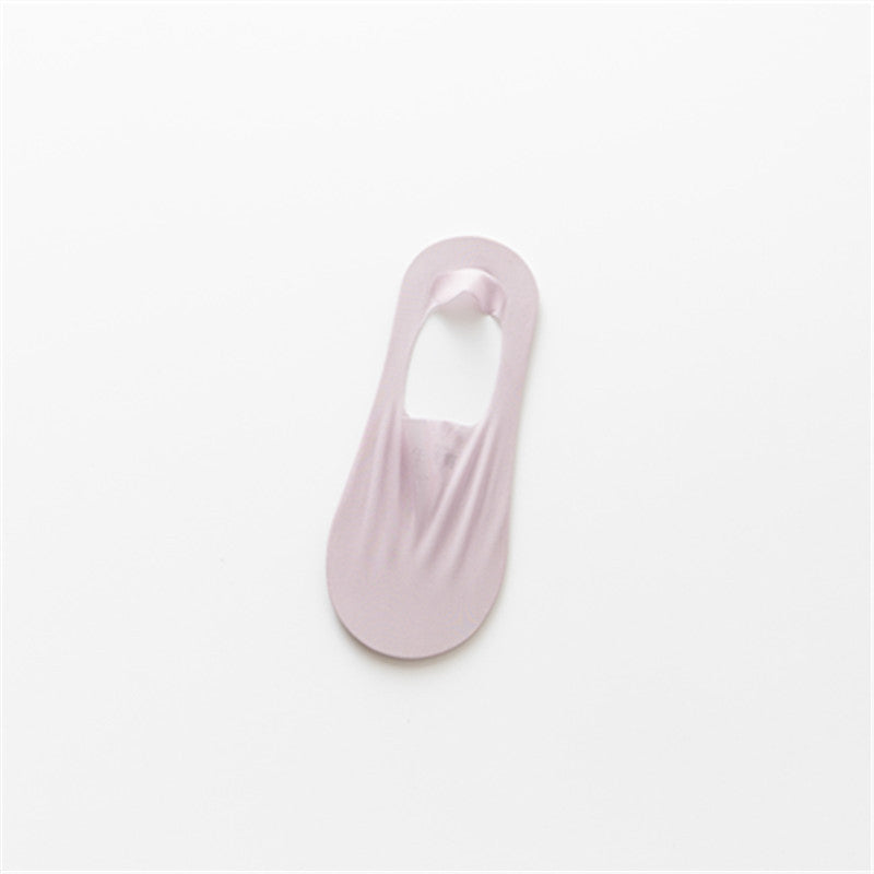 "Osynliga issilkesstrumpor med silikongrepp, osynlig design, i olika färger för maximal komfort och stil."