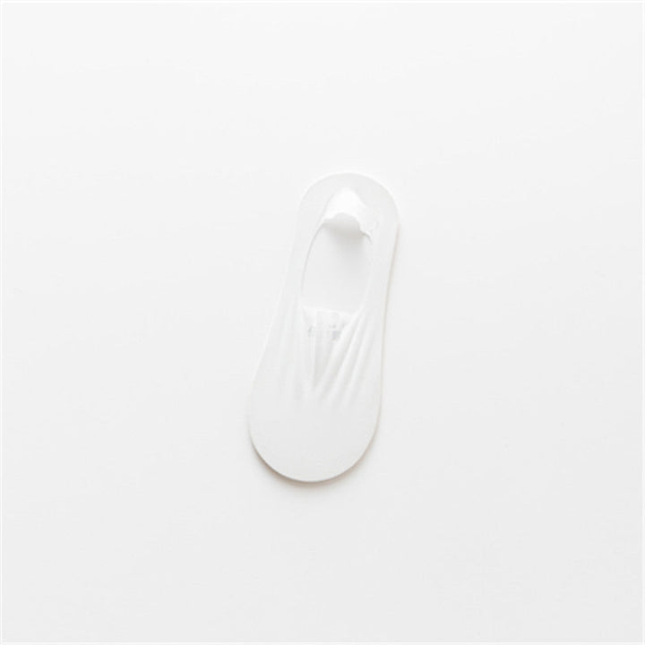 "Osynliga issilkesstrumpor med silikongrepp, osynlig design, i olika färger för maximal komfort och stil."