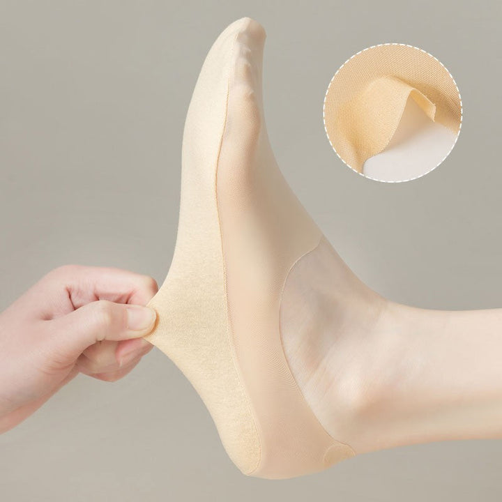 "Osynliga issilkesstrumpor med silikongrepp, osynlig design, i olika färger för maximal komfort och stil."