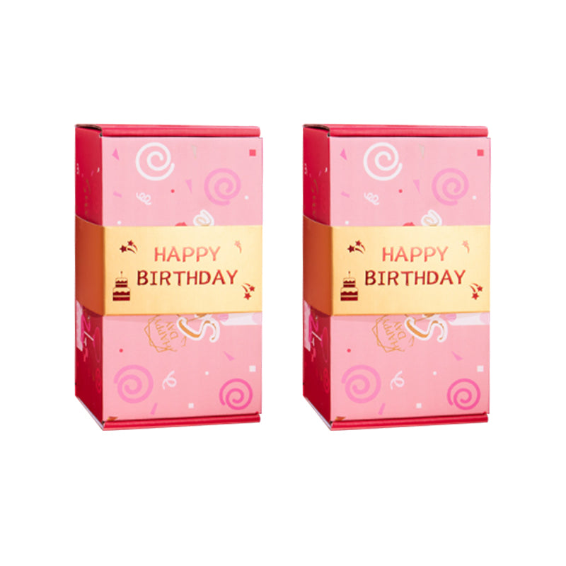 "Överraskningshoppande presentask i livfulla färger, perfekt gåva med popup-effekter, innehåller rosa och gula nyanser."