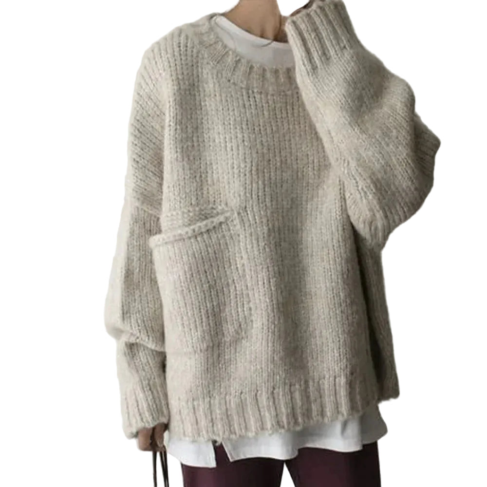 Oversize damtröja i mjukt tyg med praktisk framficka, perfekt för avslappnad look.